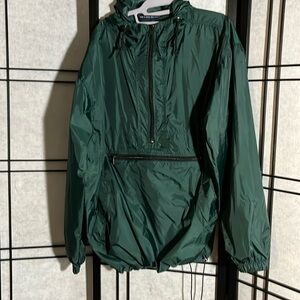 Unisex Rain jacket that folds down  to a pillow